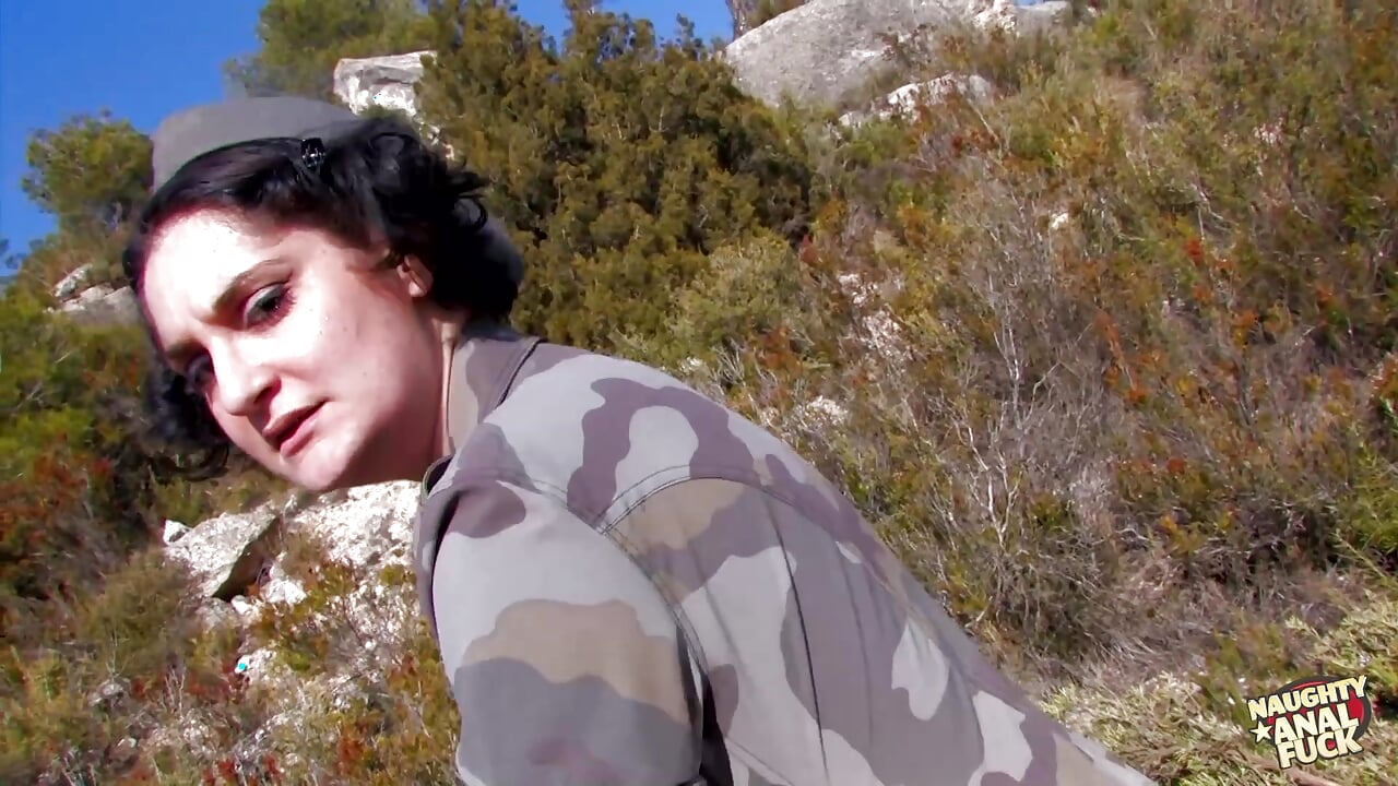 Having outdoor anal sex in army uniforms is a huge turn on for the brunette