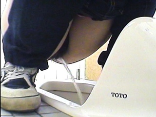 Cute amateur asian web cam girl playing with her toy